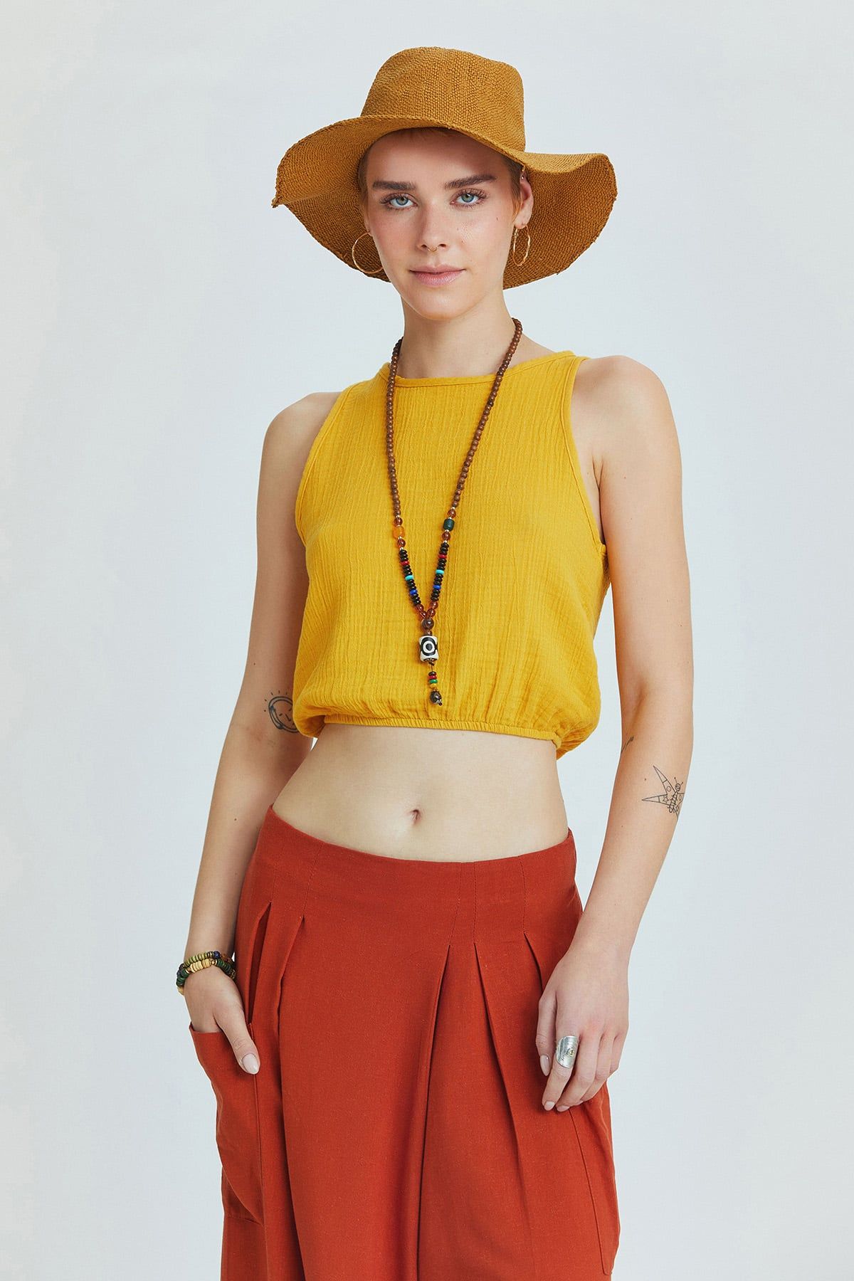 Mustard Muslin Crop Top with Halter Neck and Elastic Hem