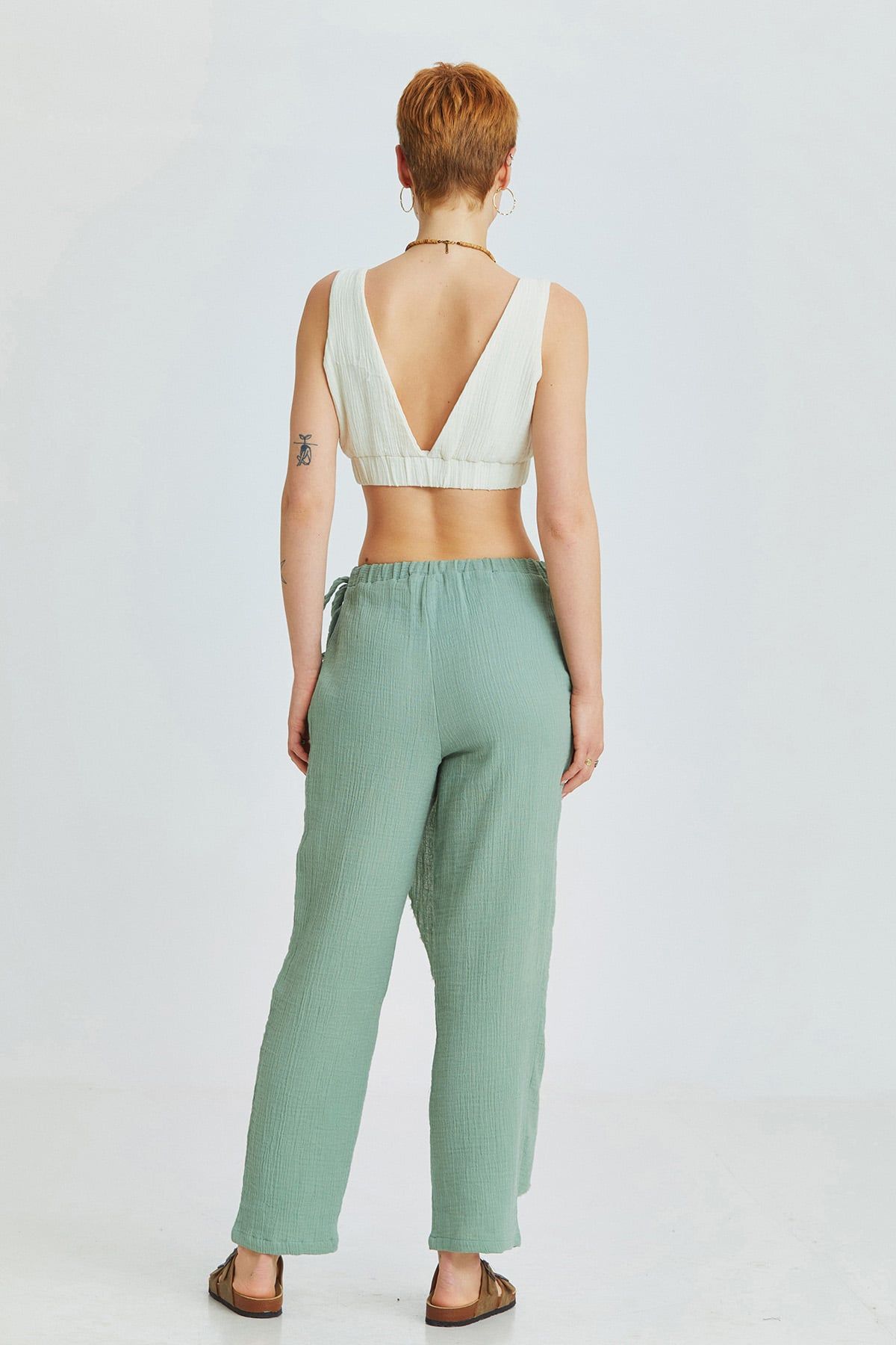 Green Muslin Summer Pants with Crossover Closure and Lace-Up Details