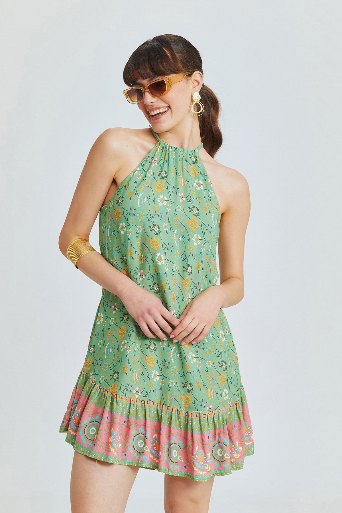 Green Mini Bohemian Dress with Halter Neckline and Patterned Ruffled Skirt