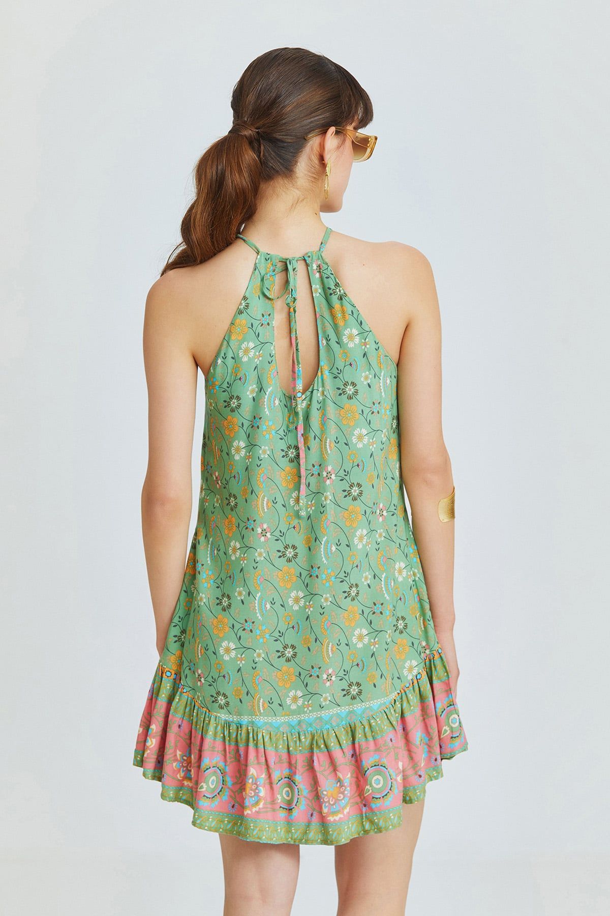 Green Mini Bohemian Dress with Halter Neckline and Patterned Ruffled Skirt