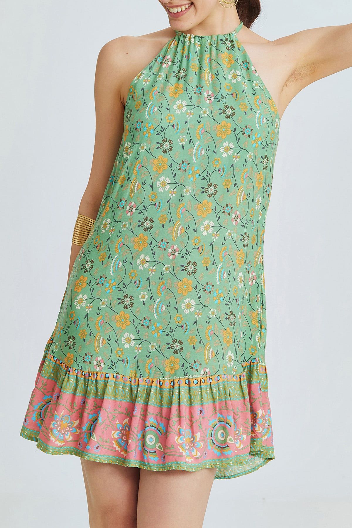 Green Mini Bohemian Dress with Halter Neckline and Patterned Ruffled Skirt