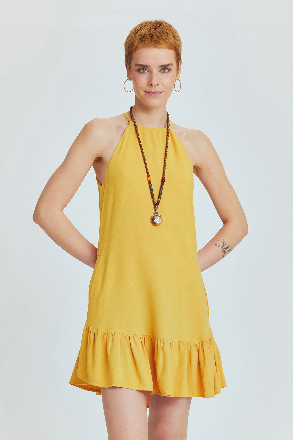 Yellow Linen Blend Mini Bohemian Dress with Halter Neckline and Ruffled Skirt